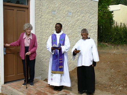 Peggy Clow-Wilson opens the door to the new building